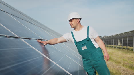 solar panel technician inspecting panels