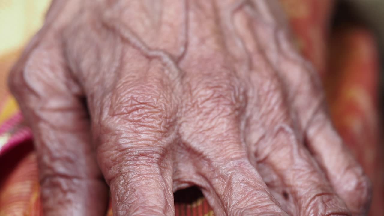Close-up of an elderly person's hand
