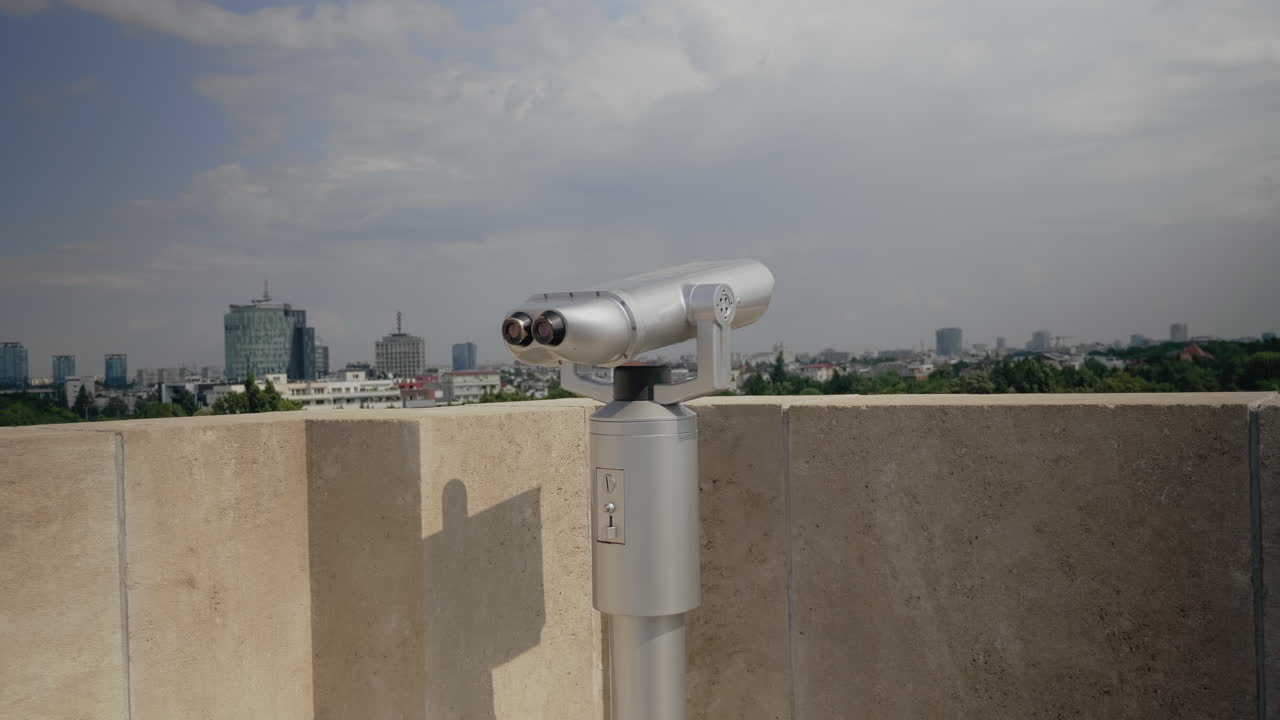 Close up of telescope on skyscraper rooftop