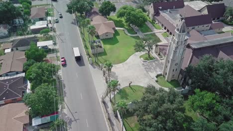 AERIAL---Church-tower,-clock-tower,-McAllen,-Texas,-United-States,-spinning-shot