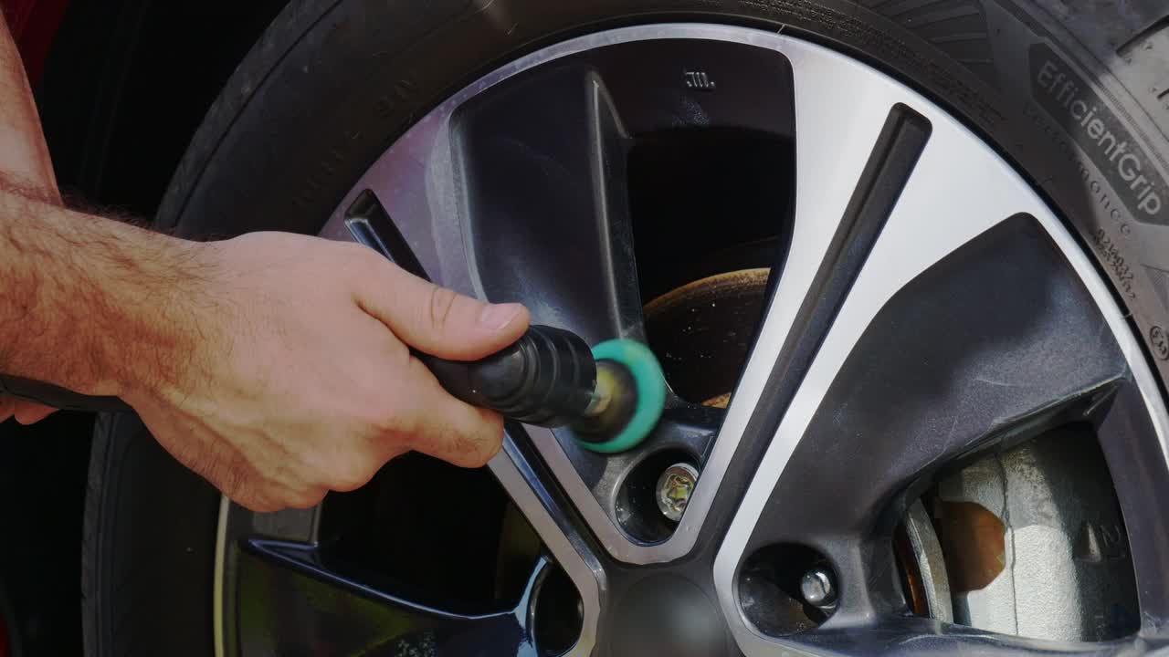 Polishing titanium grey and chrome wheels with small nano machine polisher