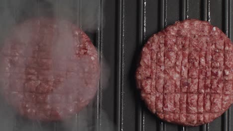 cooking burgers on a grill