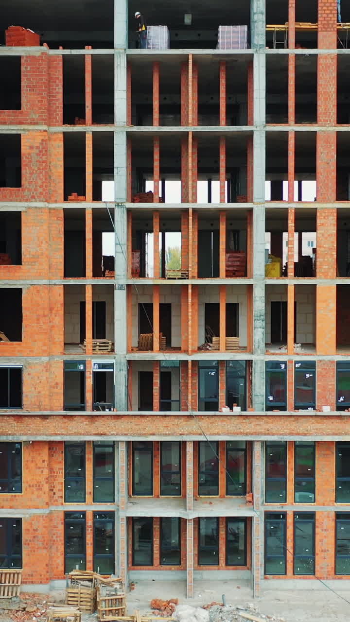 New house in residential complex. Aerial view of construction building at construction site