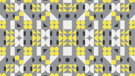 seamless loop motion graphic mosaic in trendy yellow and grey colors. symmetrical pattern with geometric animated tiles