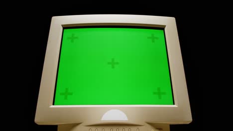 vintage crt monitor with green screen