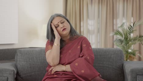 Sick-Indian-old-woman-suffering-from-headache