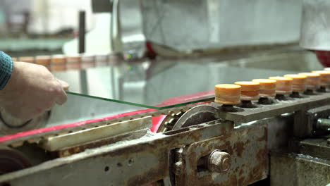 industry machine for smoothing edges of glass panels in a factory