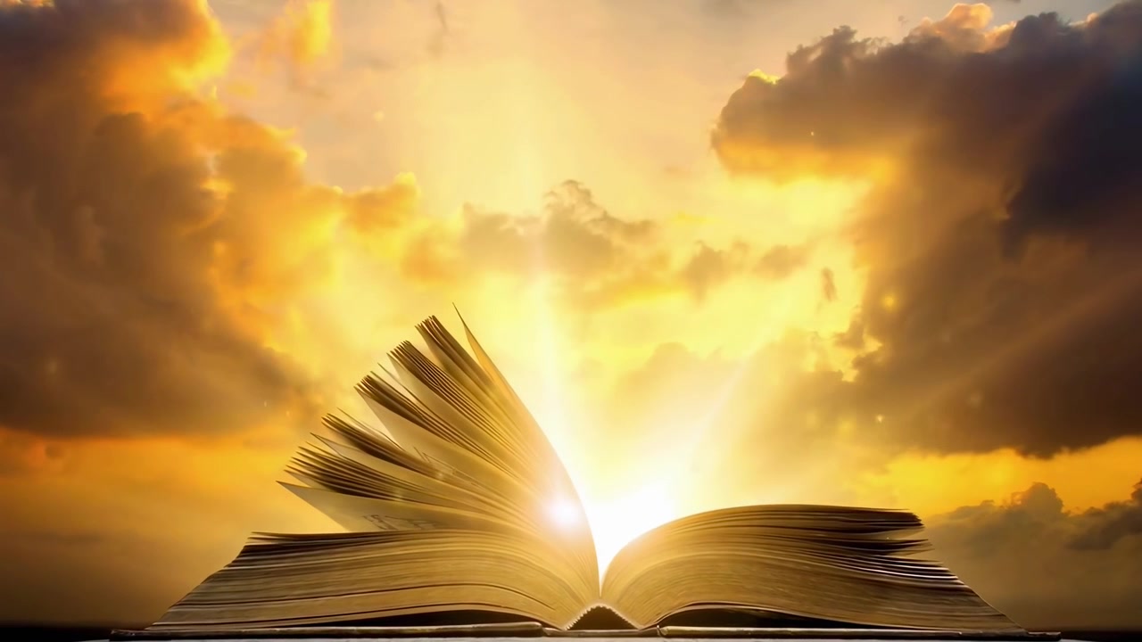 Luce dorata che emana da un libro aperto con pagine svolazzanti
