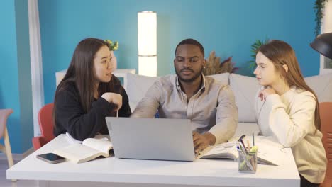 multiethnic college group studying at home. friendly environment.