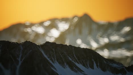 winter landscape in mountains at sunset