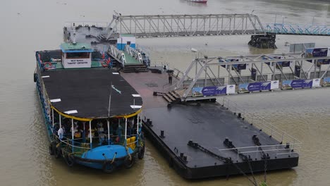 ferry boat at a river crossing in west bengal, india