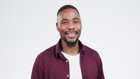 Face,-smile-and-black-man-with-wink-in-studio