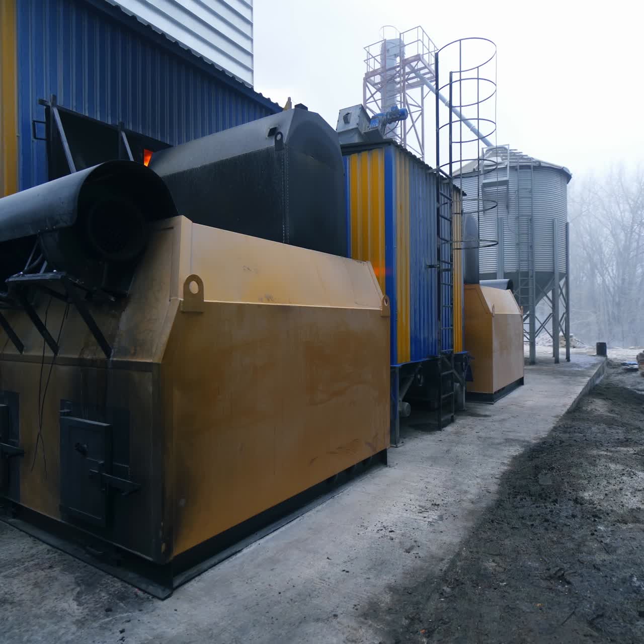Granary elevator buildings outdoors. Exterior of the elevator premises of different designation. Circle movement along the elevator structures
