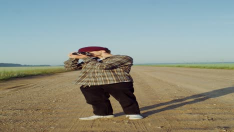 photographer on a country road