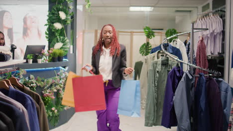 woman dancing in clothing shop outlet