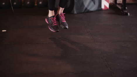 Low-Section-Of-Female-Athlete-Using-Skipping-Rope-Doing-Fitness-Training-At-Gym