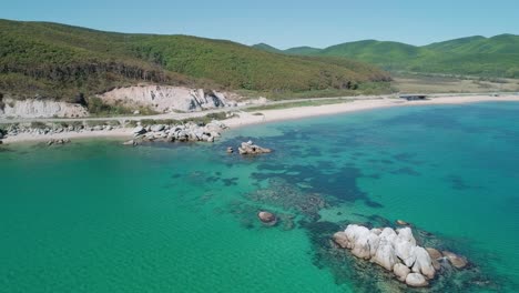 aerial view of a beach, turquoise water and huge rocks in the sea. beautiful seascape.