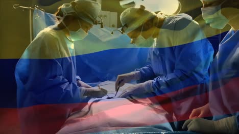 Animation-of-flag-of-colombia-waving-over-surgeons-in-operating-theatre