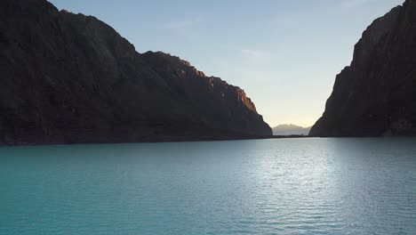 magical relaxing cove formed in the mountains with serene blue reflection of the clear sky high up in the huaraz peru, water with ripples