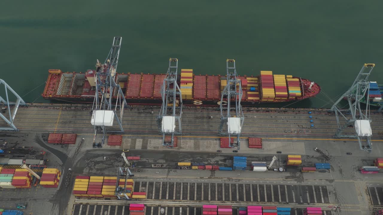 Container ship operating in export and import logistics across Asia