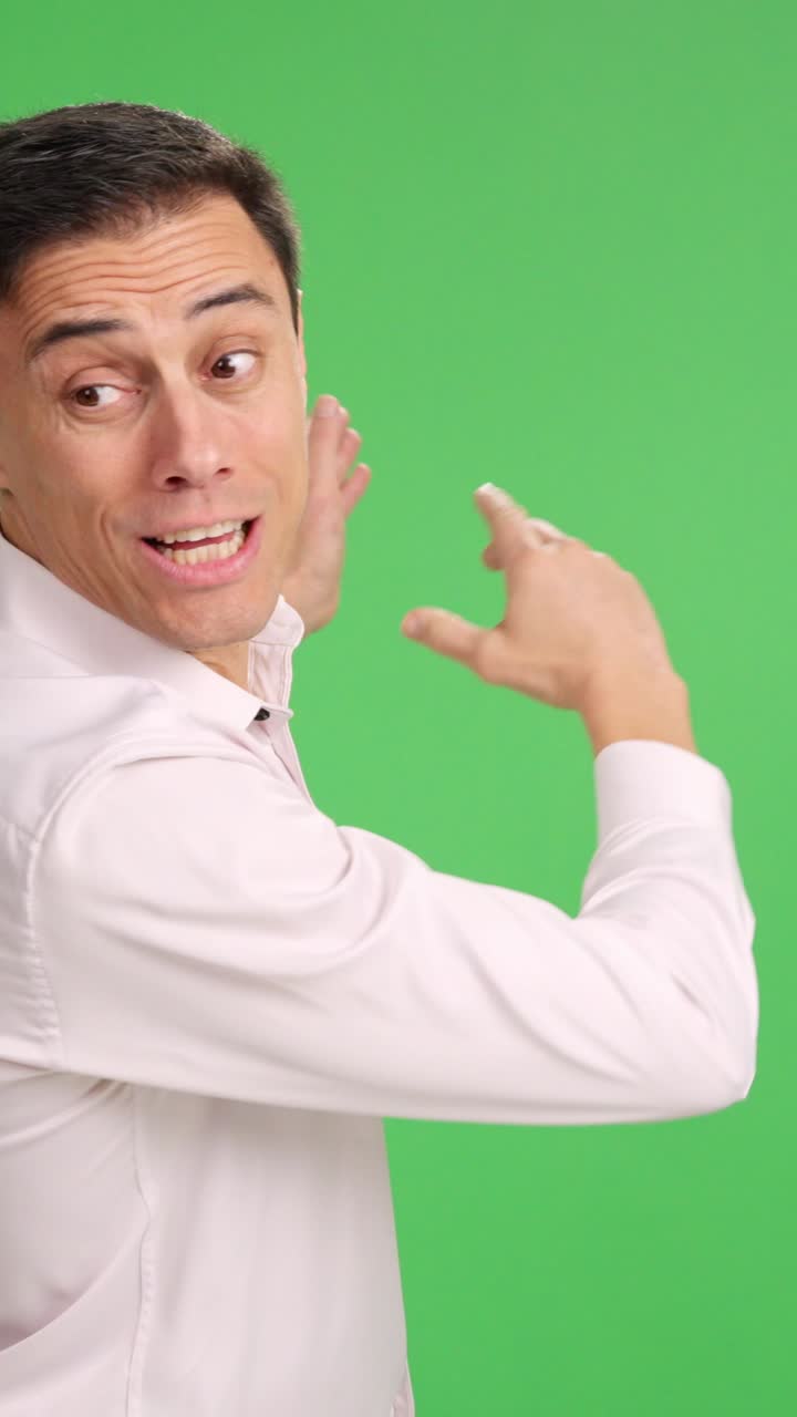 Businessman giving presentation on green screen background