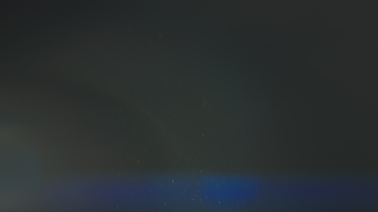 빛의 누출과 함께 어두운 추상적인 배경