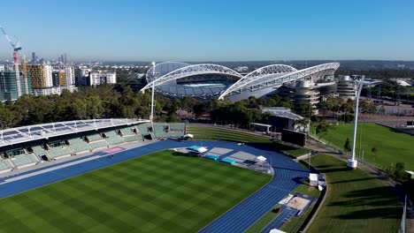 drone aerial athletics training facility oval sports fitness arena accor stadium running track seating velodrome sydney olympic park homebush bay nsw west sydney australia tourism 4k