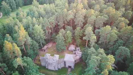 Reconstructed-Wooden-Castle-of-Semigallians-in-Tervete,-Latvia-Surrounded-by-Pine-Forest