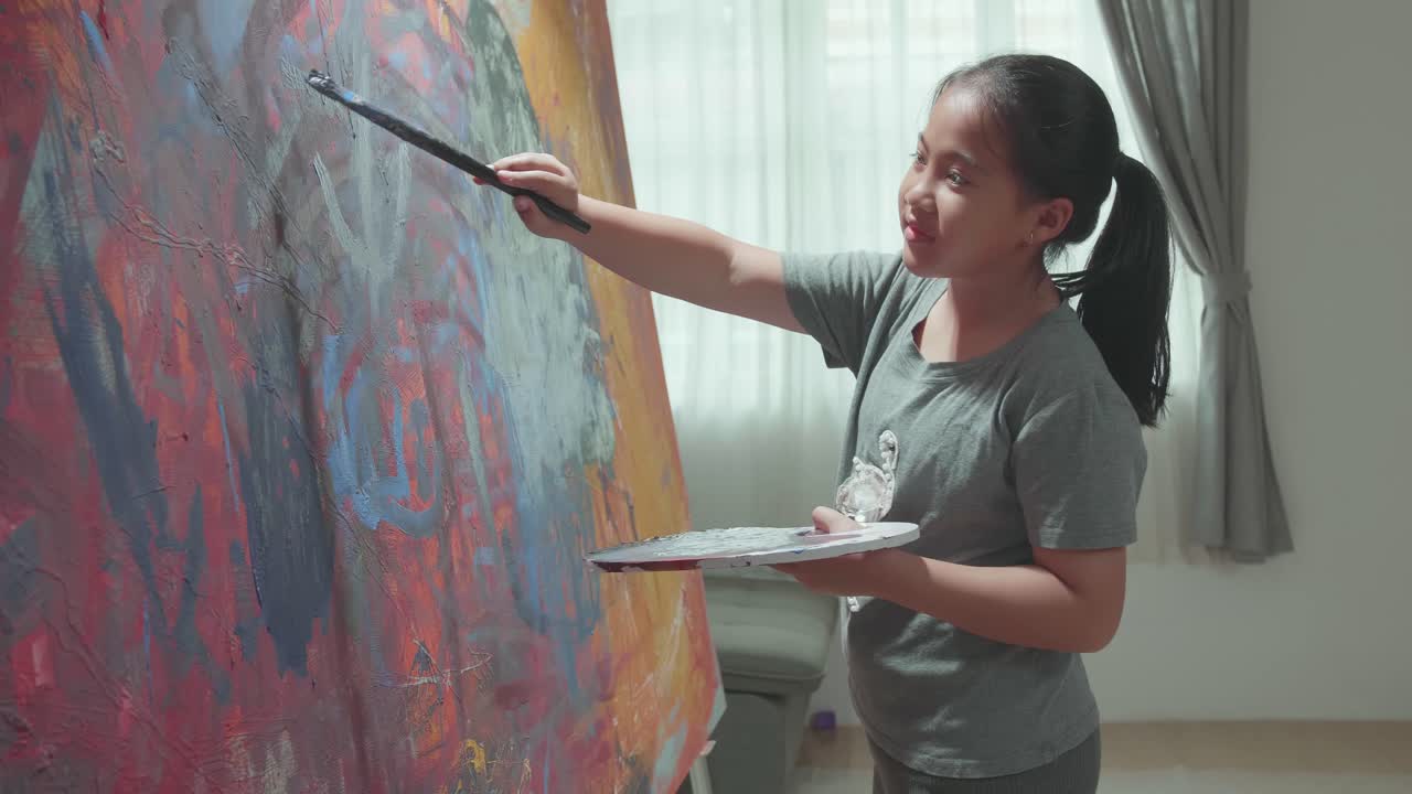 Young Girl Painting Abstract Art at Home