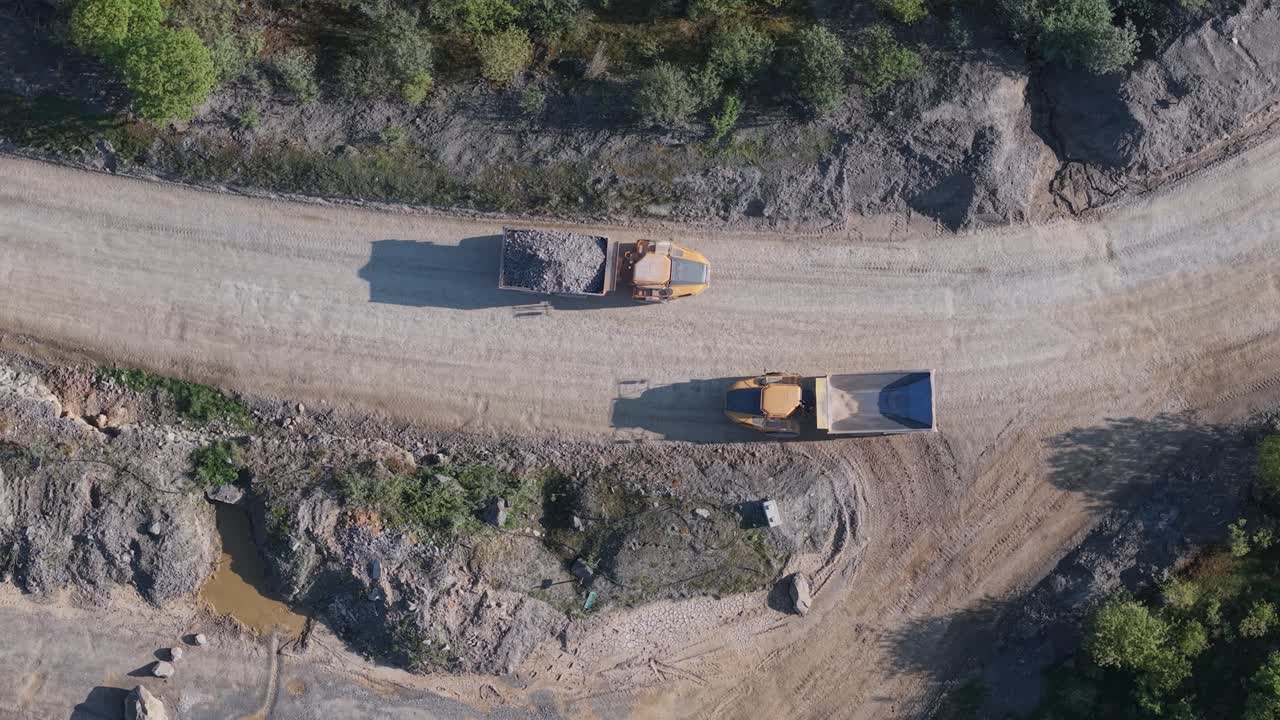 Quarry trucks on dirt road in Roadstone Mullaghcrone, Meath, Ireland