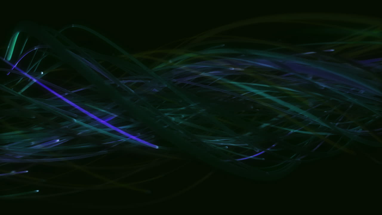 Twisting bundle of blue and green fibres moving across black background