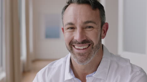 portrait attractive man smiling confident independent male in apartment home