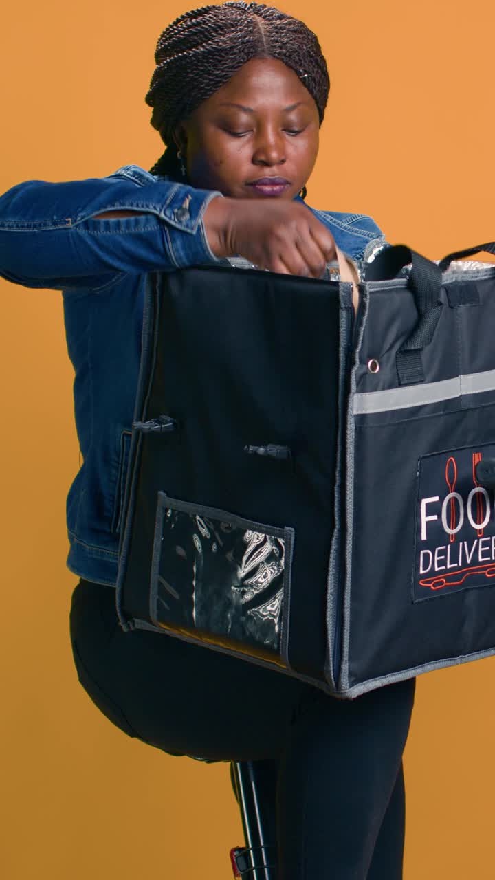 Food delivery with a woman wearing a denim jacket