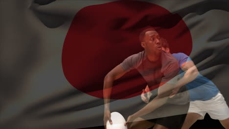 diverse rugby scene with a tackle and a japanese flag.