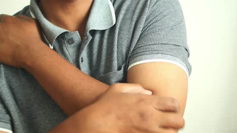 man with arm pain or injury