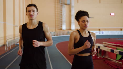 Front-view-of-athletes-running