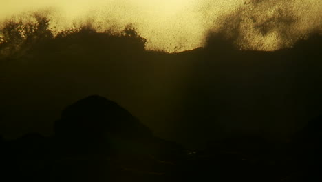 large waves as they crest and break in slow motion at sunset 1