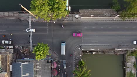 aerial directly above a chaotic asian road intersection