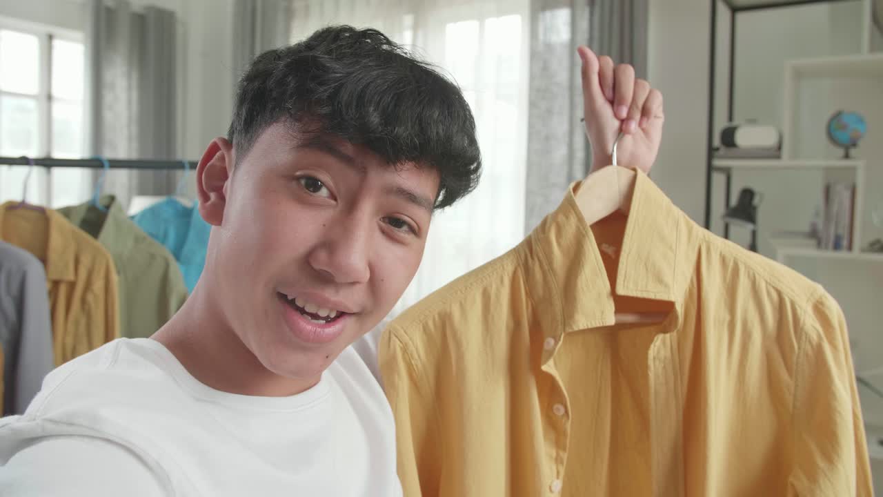 Teenager Shows Off New Yellow Shirt