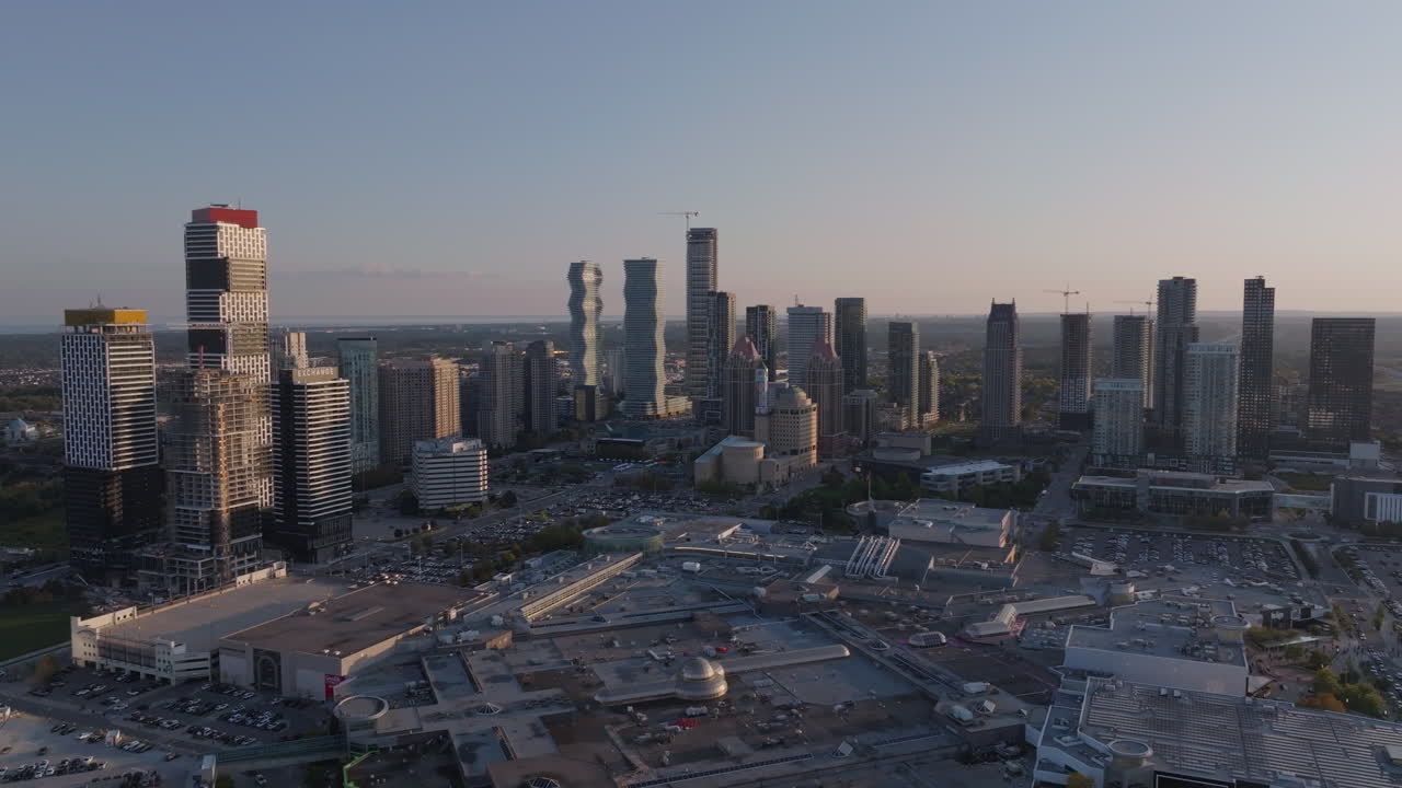 High-rise view of Square One, Mississauga at sunset, vibrant urban scene
