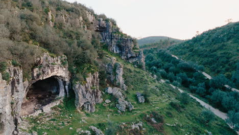 buracas valley in portugal large cave medium long slow motion drone shot