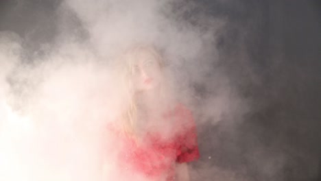young girl posing on foggy