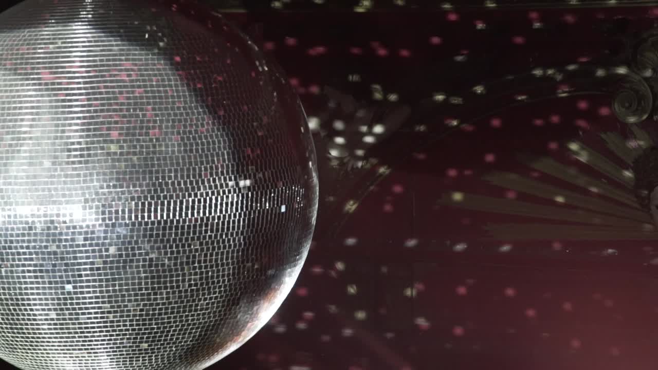 huge disco ball in slow motion on a club in London 3