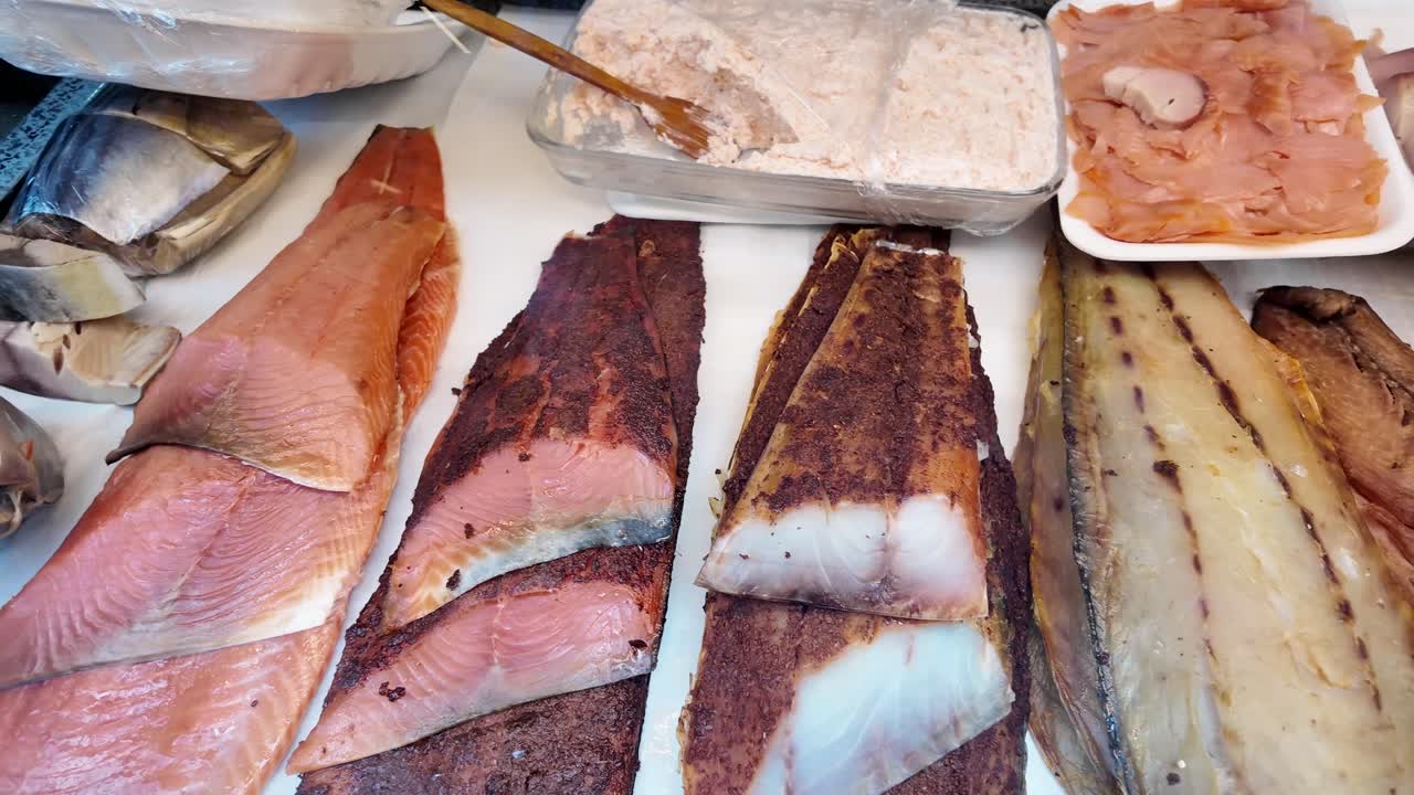 Selection of Smoked Fish at a Delicatessen