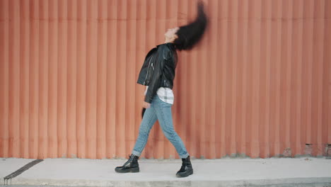 stylish woman walking in urban setting