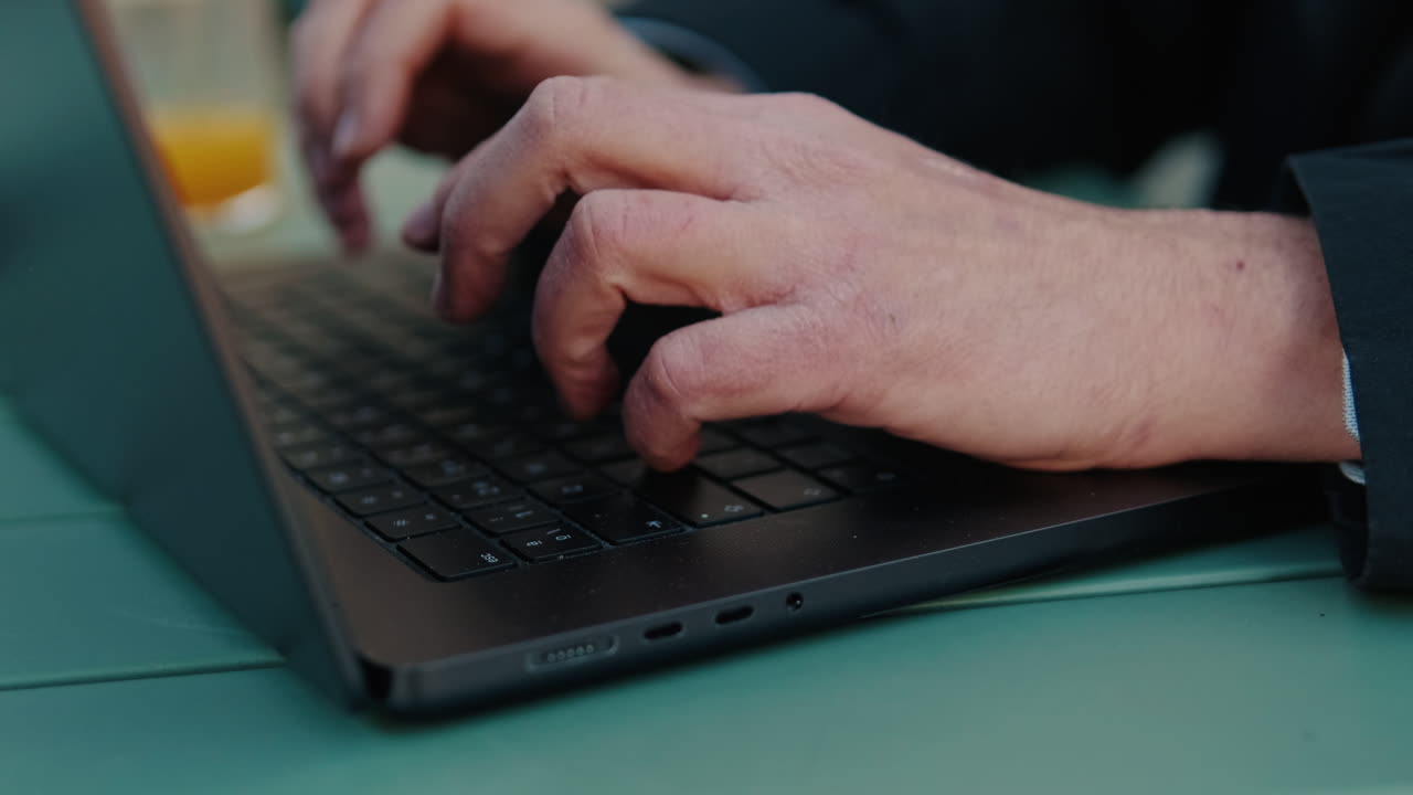 Businessman Working Remotely on Laptop