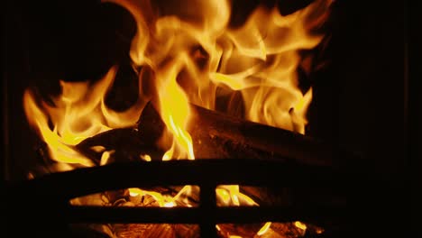 looping fireplace with real flames and burning logs. ideal for winter screensaver in 4k