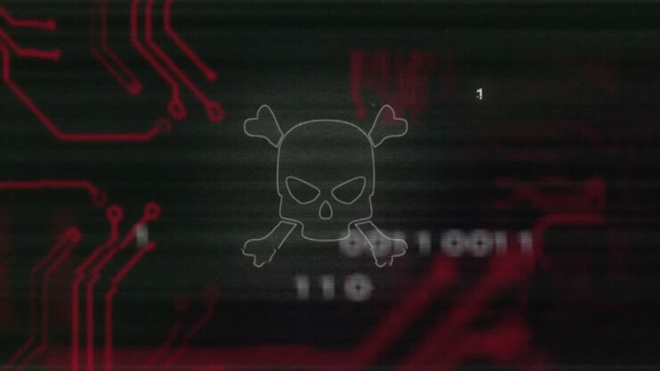 Skull and crossbones with binary code and circuit board animation