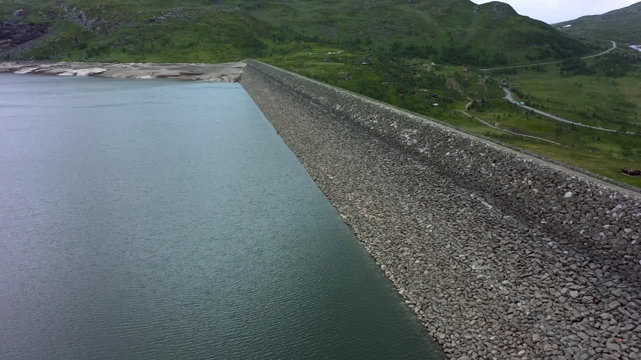 The Sysen Dam is a rock-fill embankment dam in the municipality of Eidfjord in Vestland, Norway.The water supply to Vøring Falls is regulated by the dam - Hydroelectric renewable energy storage