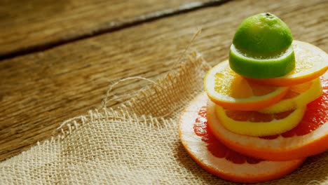 various citrus slices stack on jute fabric 4k 4k